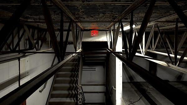 An apartment doorway at night lit by a single ceiling bulb, with the door standing partly open onto a dim hallway